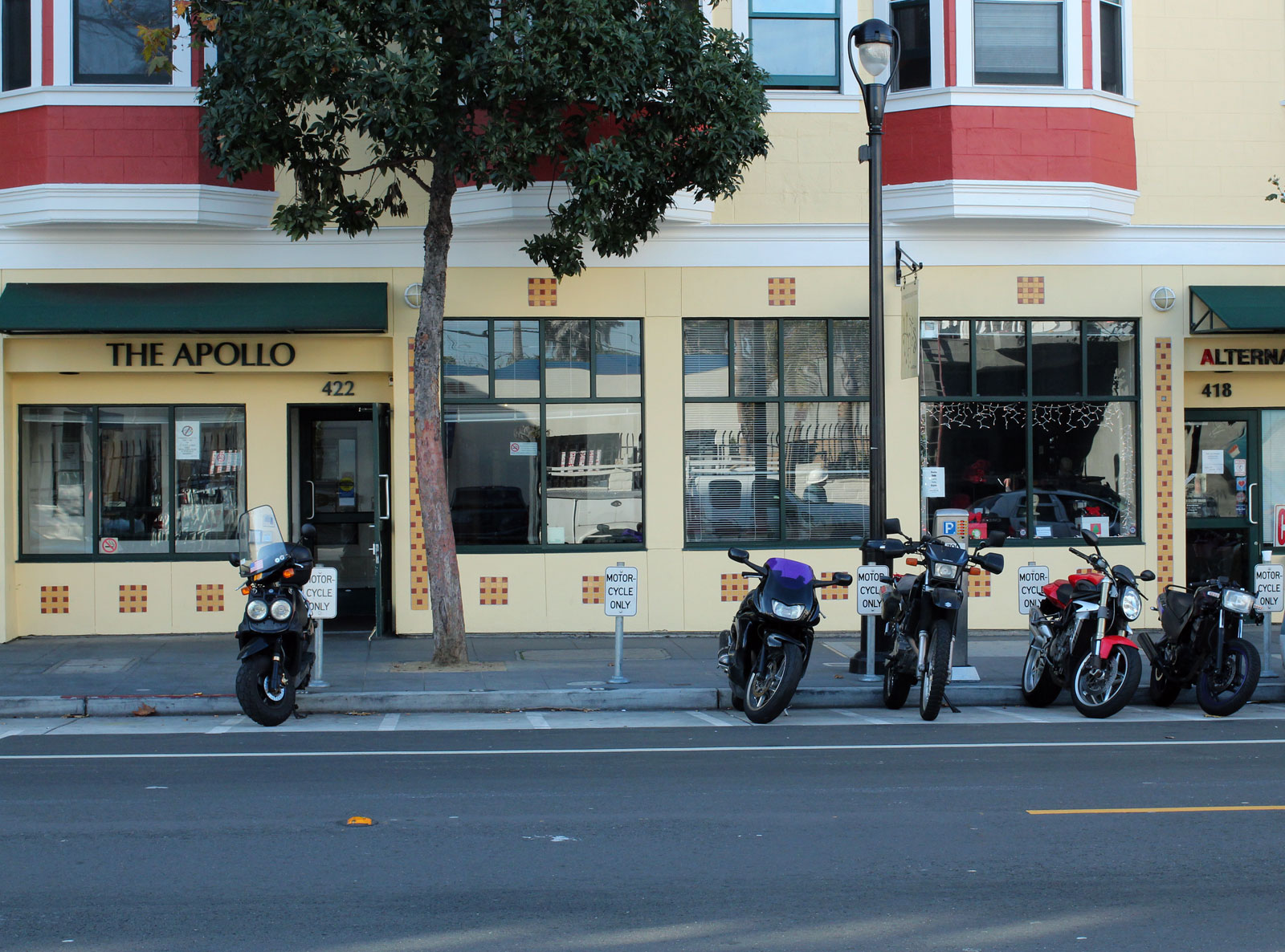 A motobike sits apart from three others