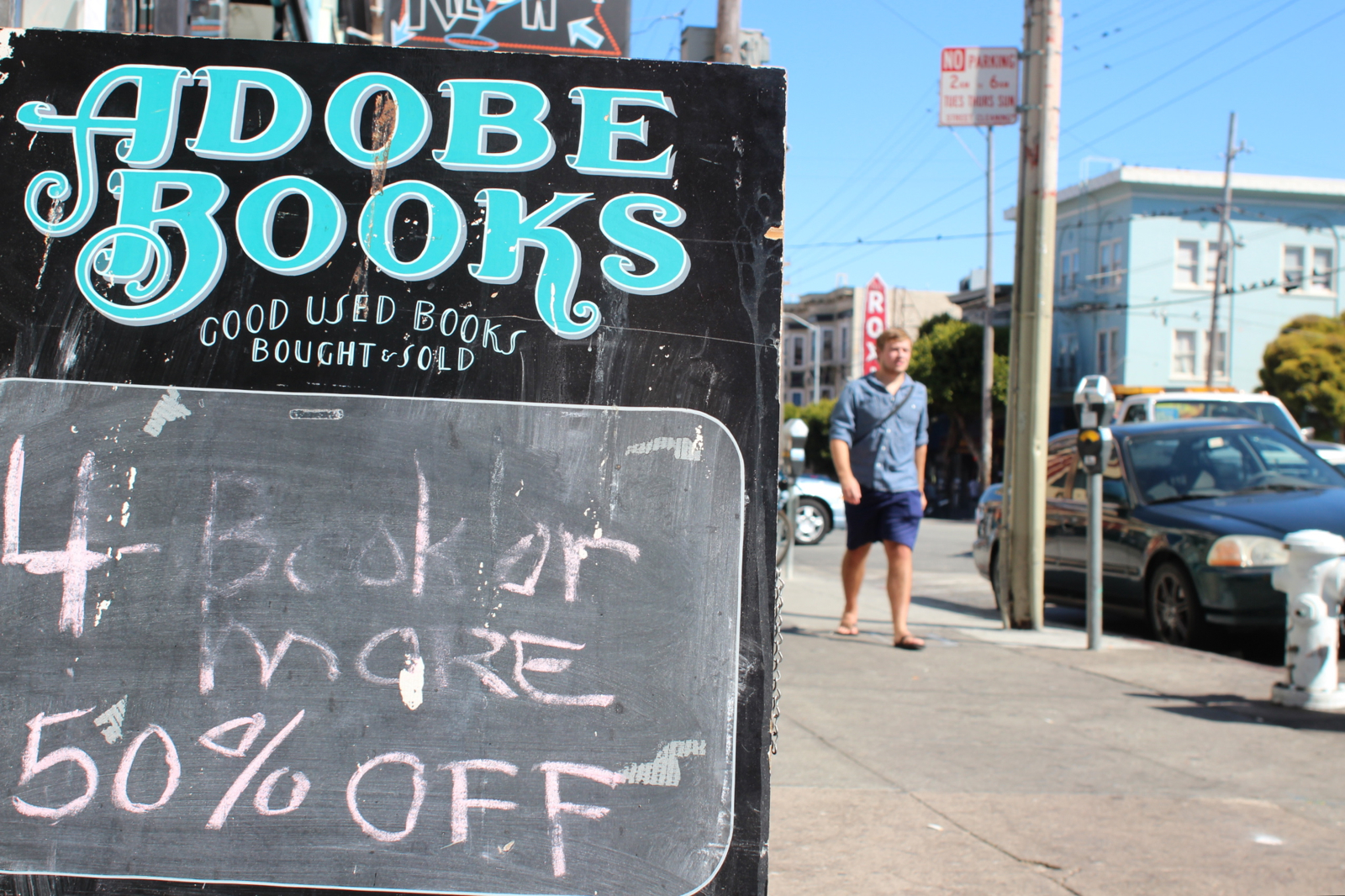 sale sign at Adobe Books