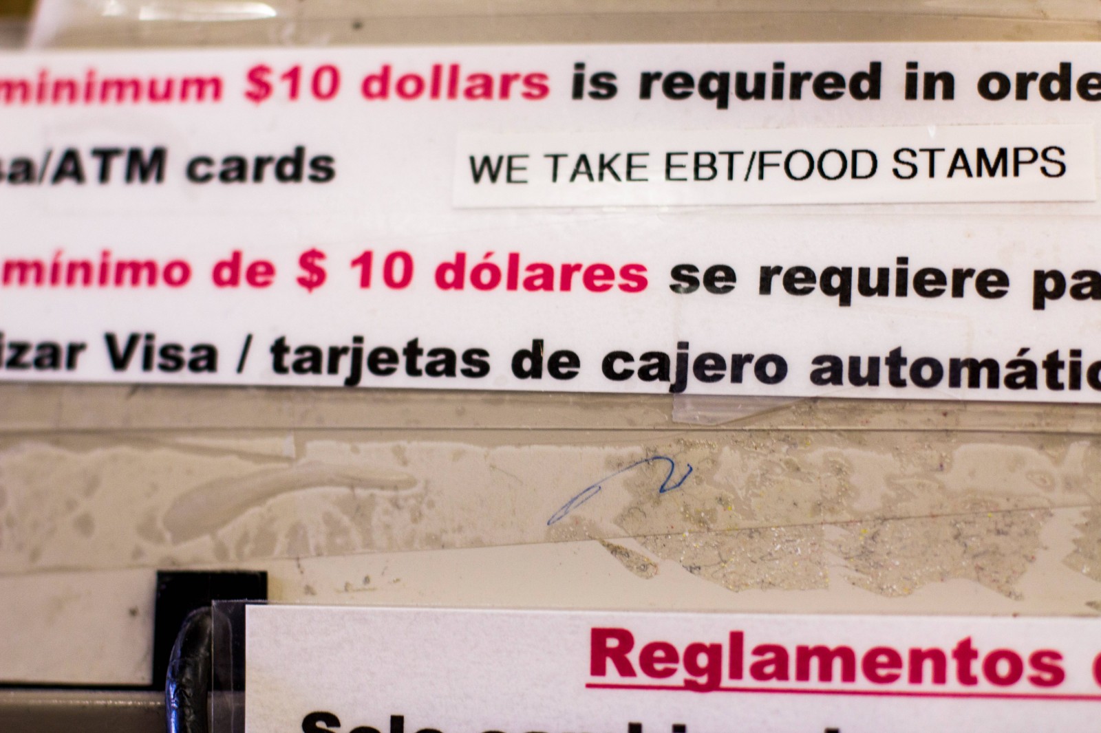 cash register covered in language concerning purchases