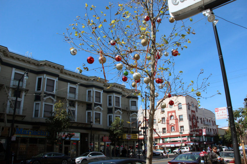 A tree with Christmas ornaments.