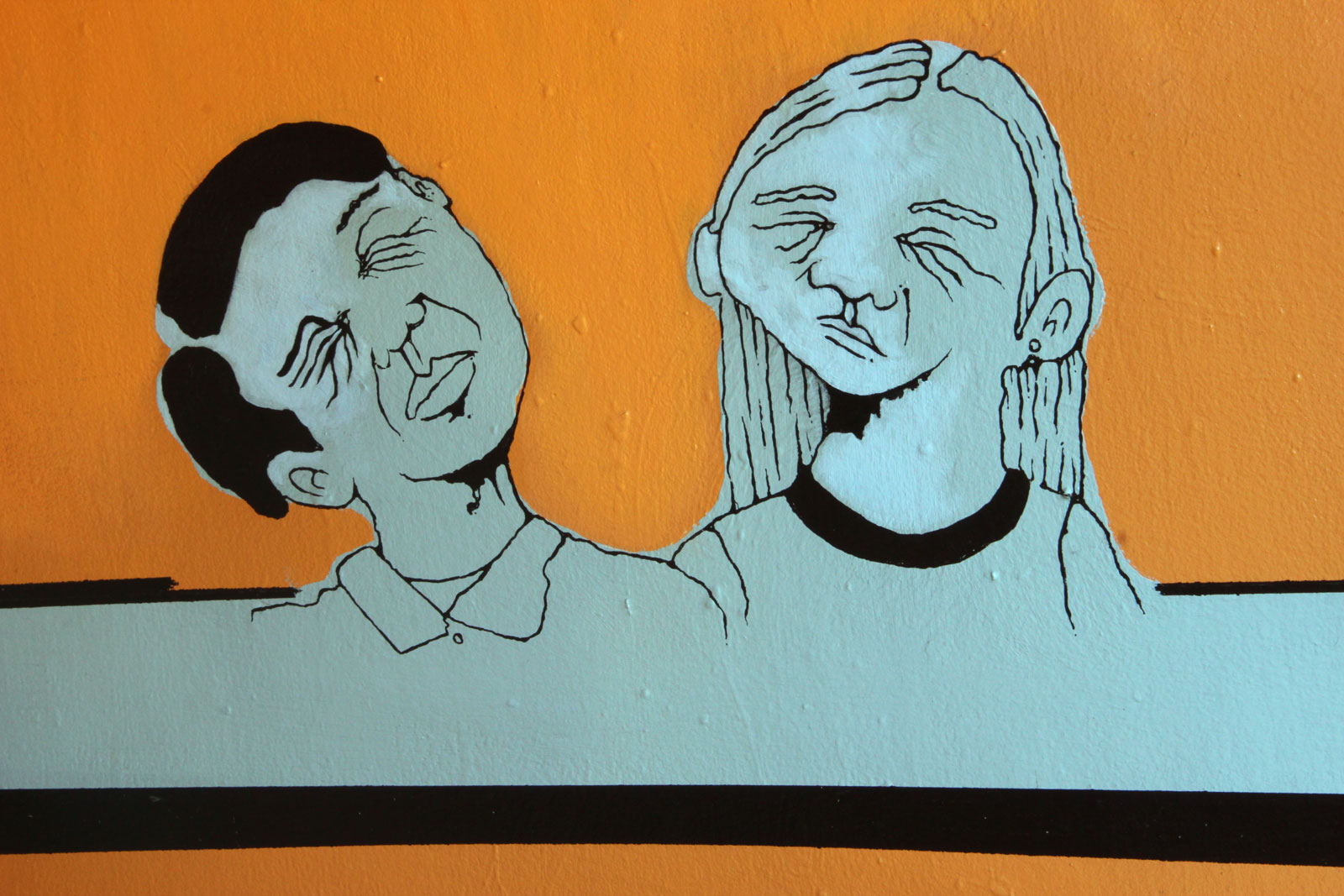 A mural of a man and a woman.