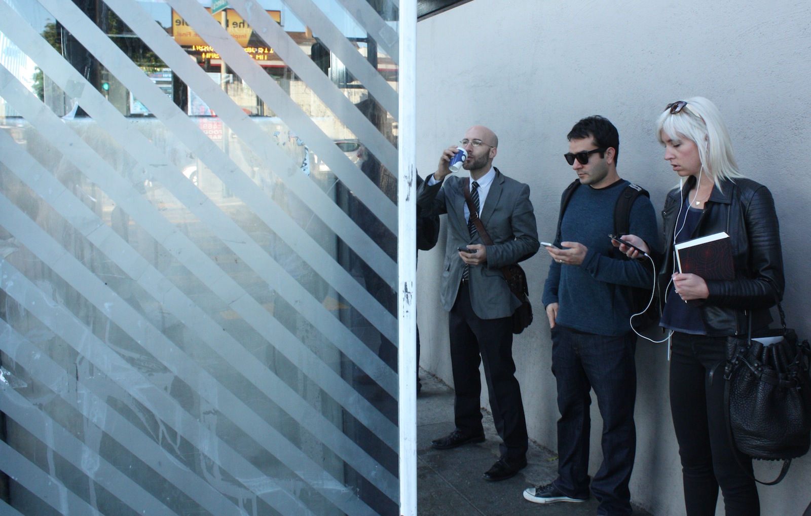 Tech workers waiting for buses.