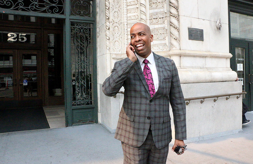 Paul Henderson speaks on the phone