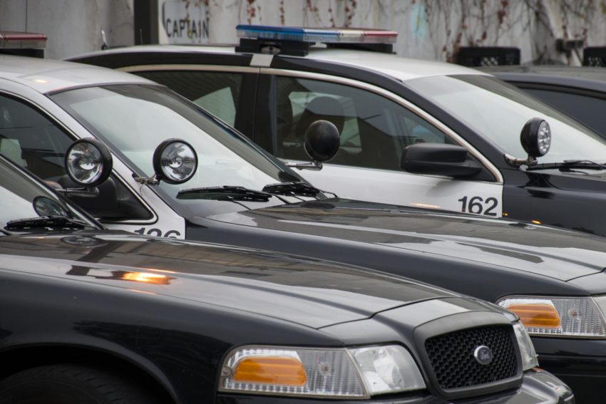 Police cars; A stabbing left one International High student dead