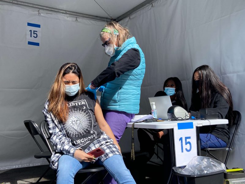 Samaya Pupiro Covid-19 vaccine shot at Excelsior Strong Latino Task Force New Covid-10 vaccine site in Excelsior District