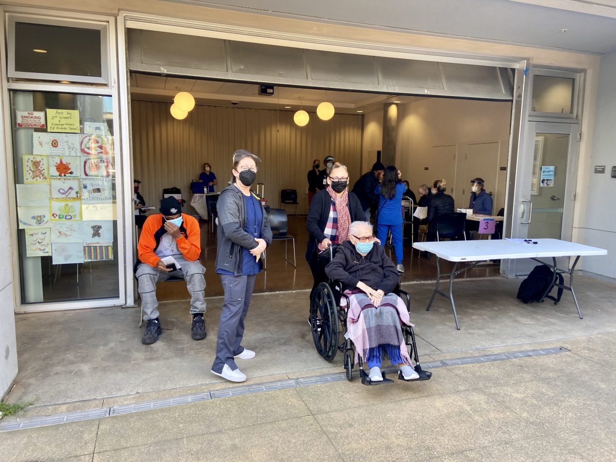 A woman in her 90's from Nicaragua, is wheeled away by her daughter after receiving her dose at the Mission Housing vaccine pop-up. According to director Marcia Contreras, she was hesitant about the vaccine at first, but now will travel to see family back in Nicaragua. Pop-up vaccination site at Mission Housing in the Mission, San Francisco.