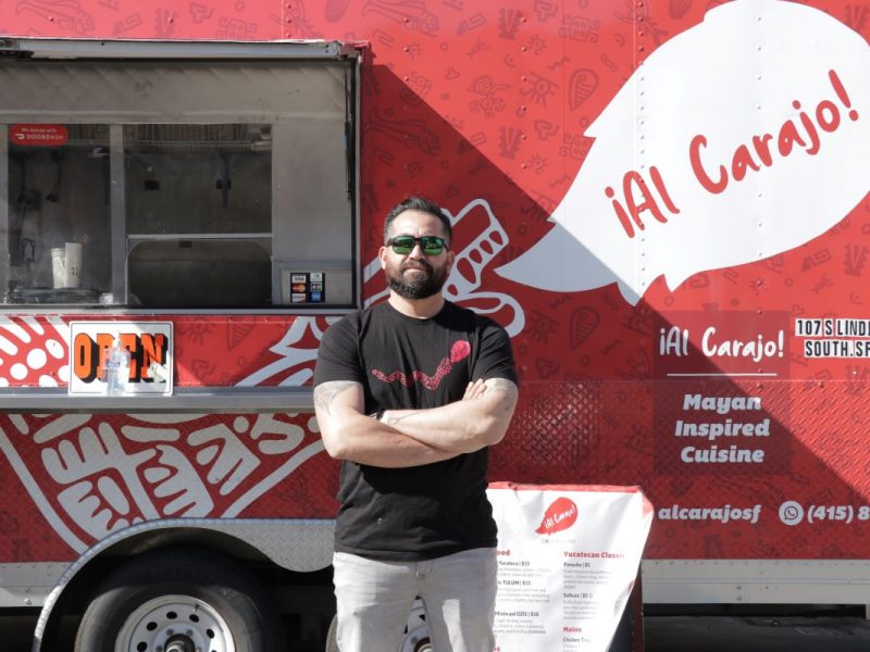 Javier Leon poses in front of his Al Carajo truck.