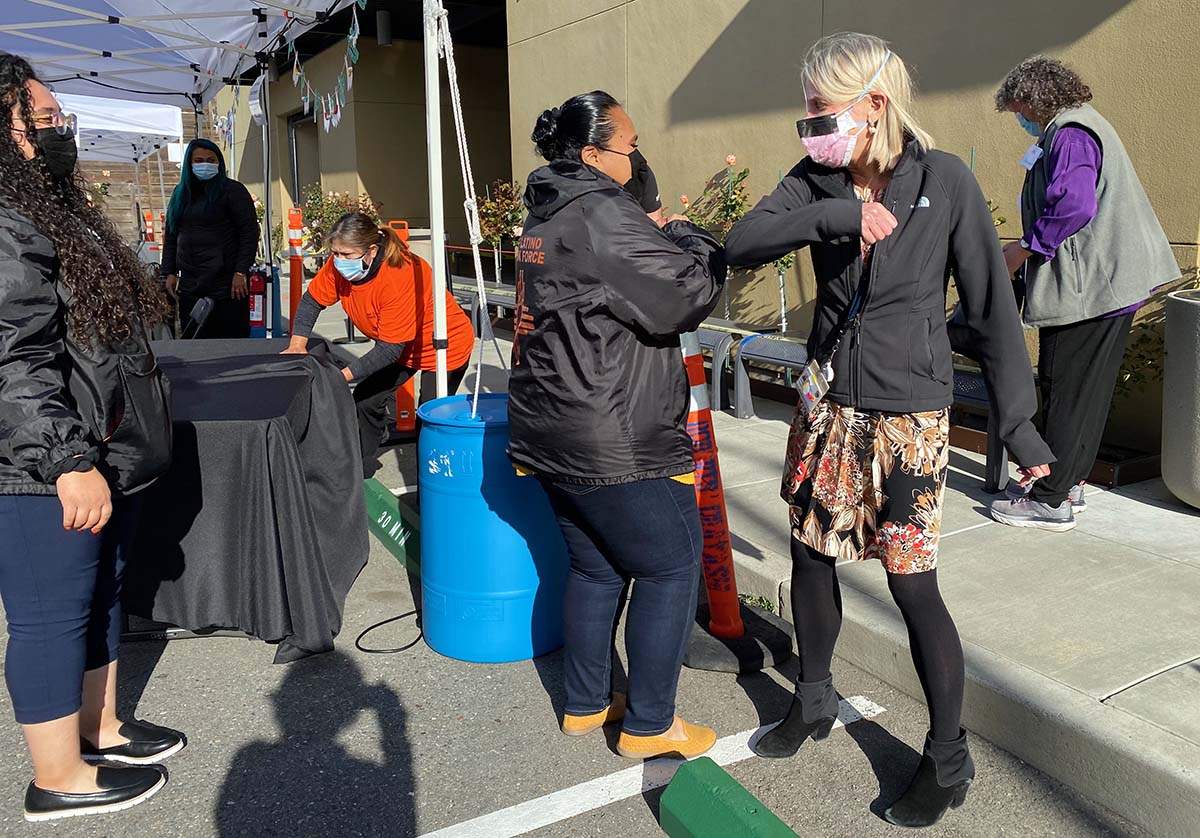 Susana Rojas, Dr. Diane Havlir, 18th and Shotwell vaccinations