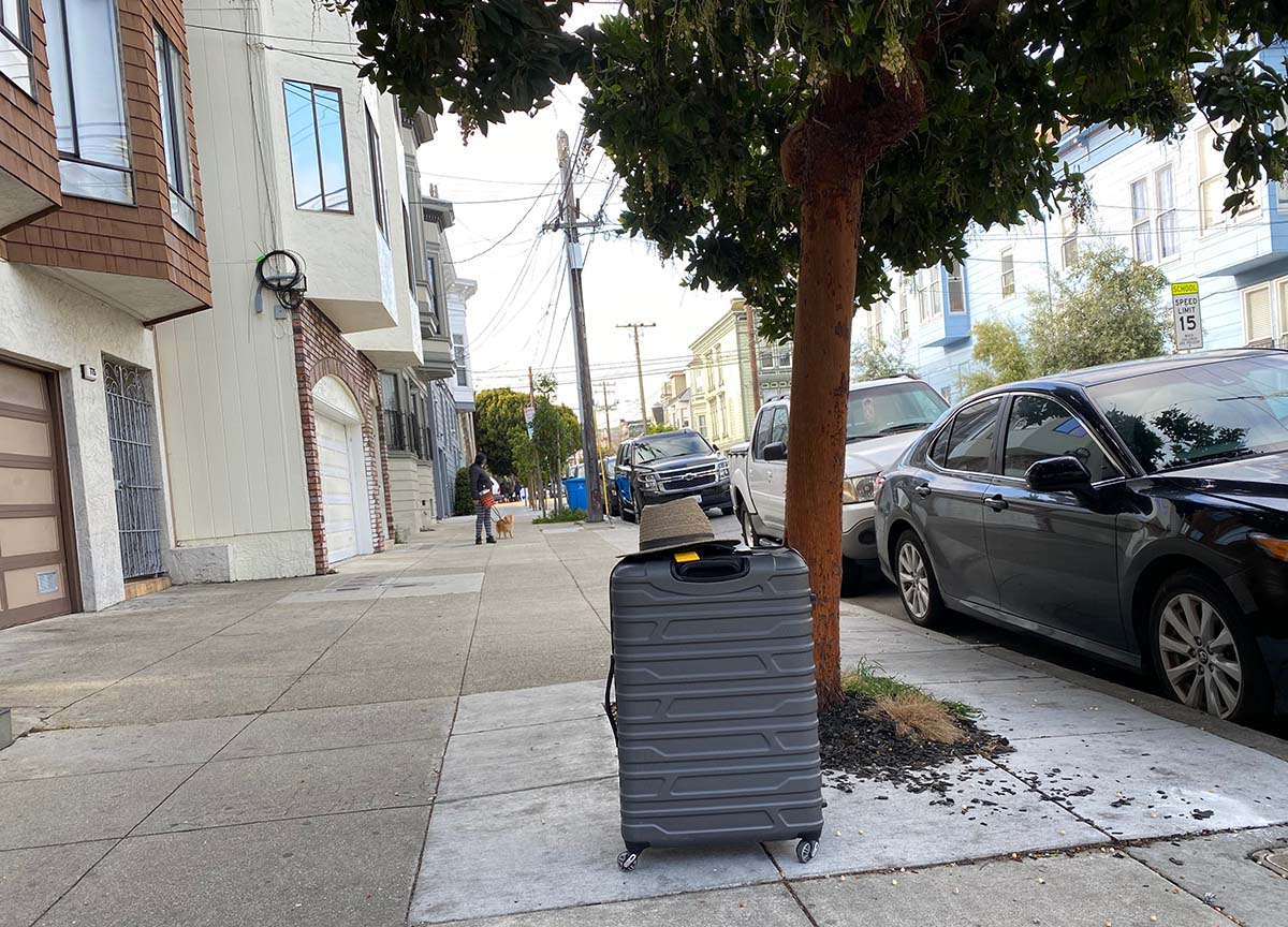 Suitcase and hat on Treat Avenue
