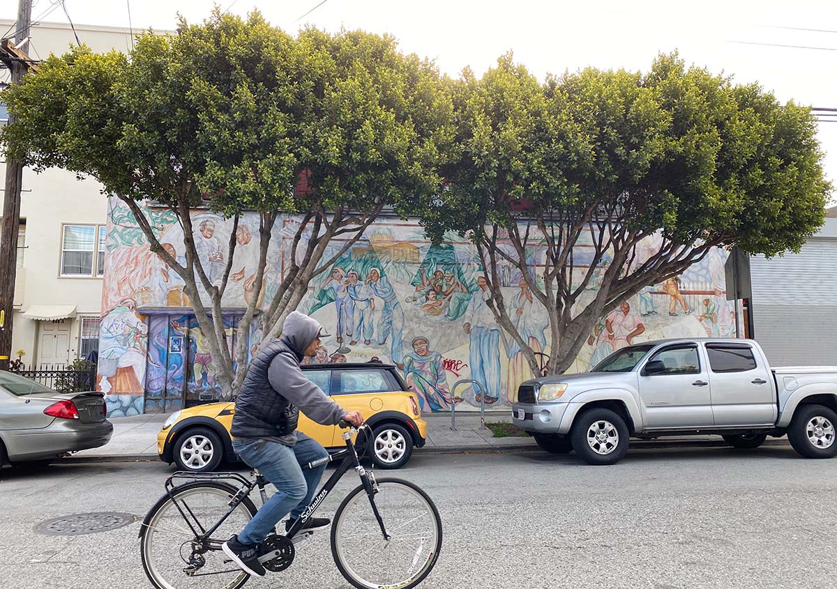 Roses/Para las Rosas by Juana Alicia in the front of the SF Mime Troupe's building at 855 Treat Ave.