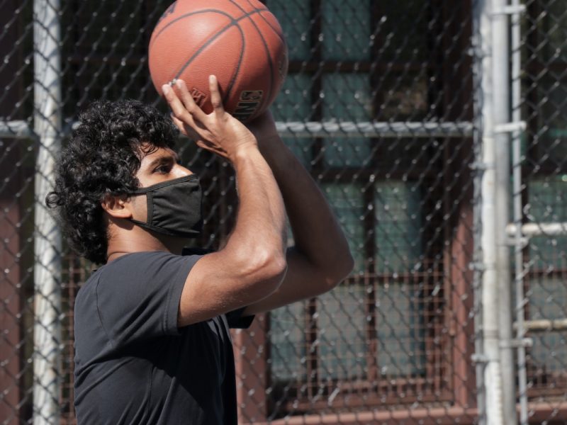 Suraj Menon shoots hoops at Mission Playground.