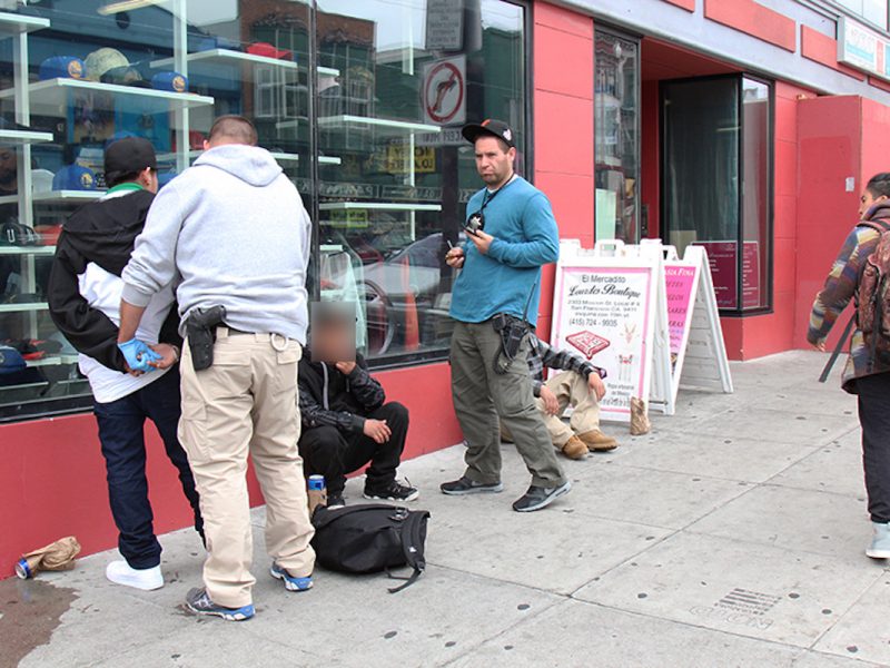 Men detained on 19th and Mission, 2018. Photo by Abraham Rodriguez.