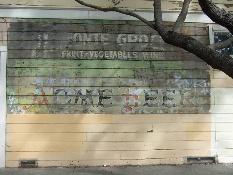 Faded Acme Beer sign in the Mission