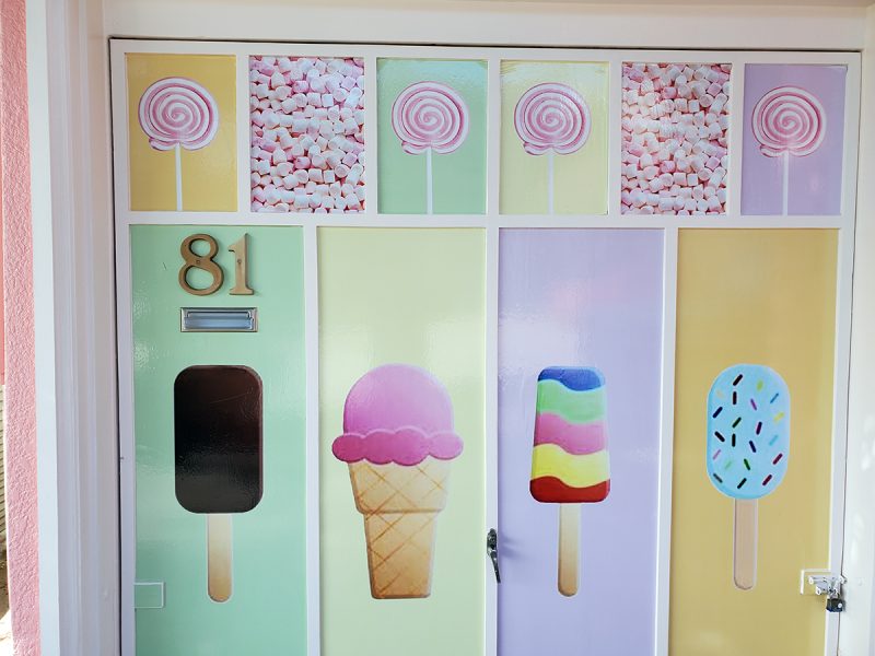 A door at the address of 81 with images of ice cream cones