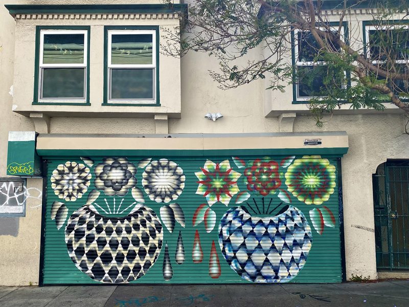 A mural showing flower vases on San Carlos Street