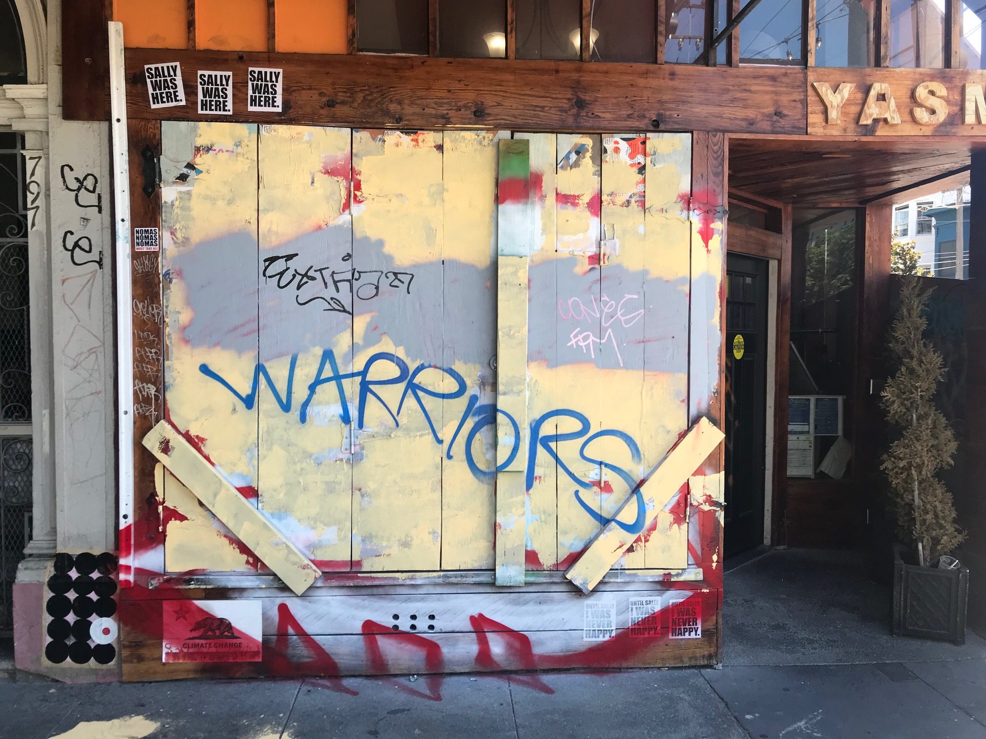 Warriors written on the side of a wall