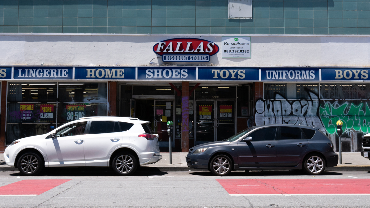 The outside front doors of Falla's discount store.