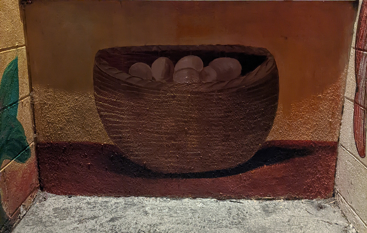 A mural of a basket full of eggs.