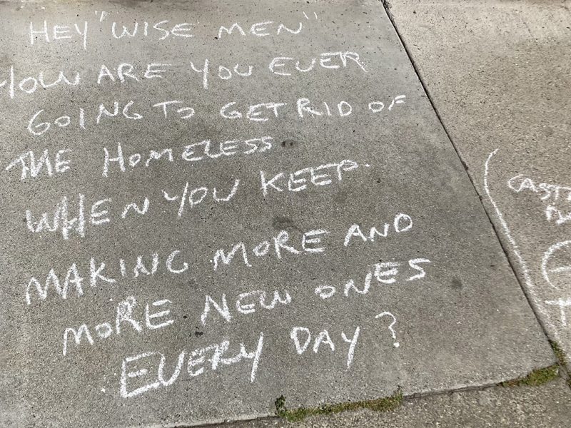 Sidewalk message: How are you going to get rid of the homeless when you keep making more