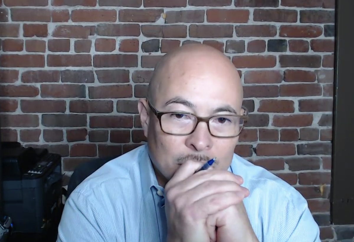 John Hamasaki during a Police Commission meeting