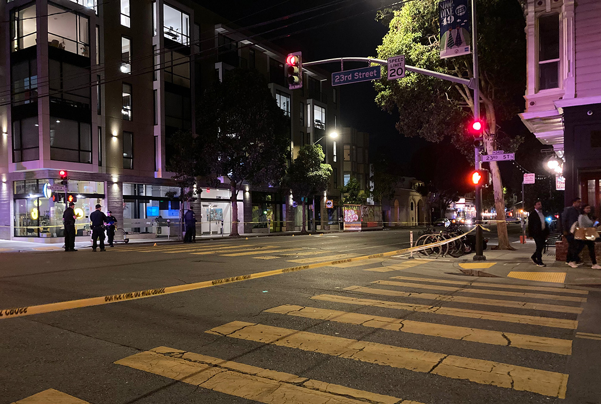 Photo of intersecton with police tape.