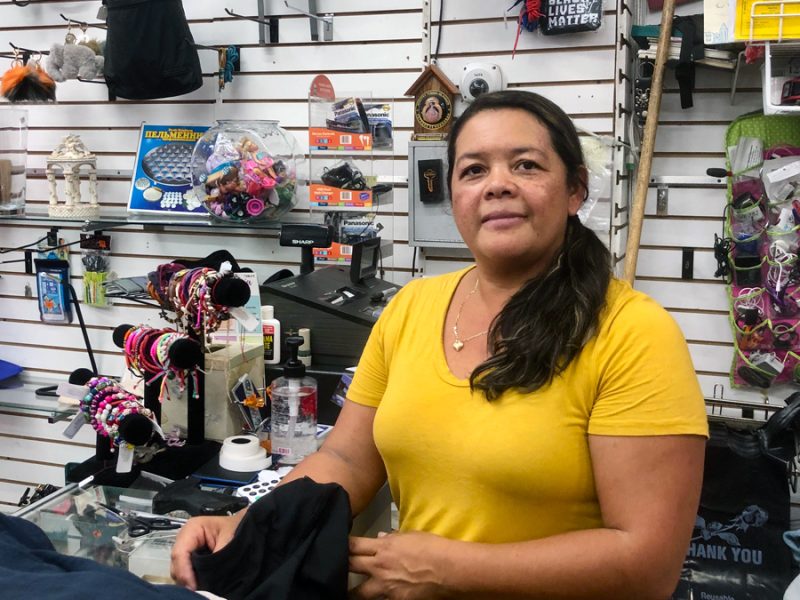 Brindissy Garcia stands behind the counter of the Pikitos, her own thrift shop.