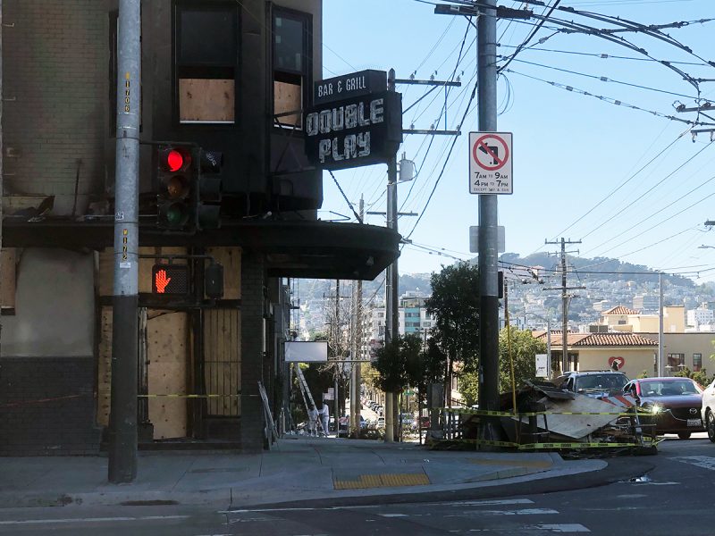 A photo of double play, a bar with boarded up windows