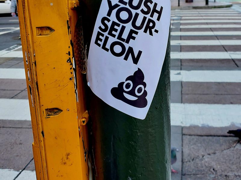 A sticker that reads, Go flush yourself Elon.