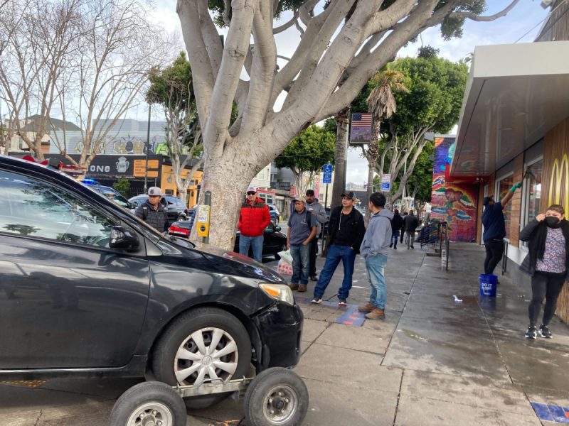 Car on sidewalk 24th Street Mcdonalds