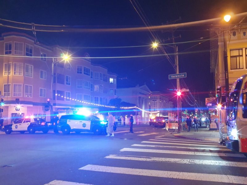 Police at 16th and Valencia streets after a driver struck a pedestrian.