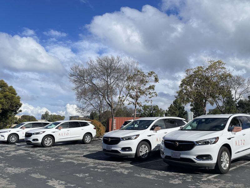 A few cars in a parking lot