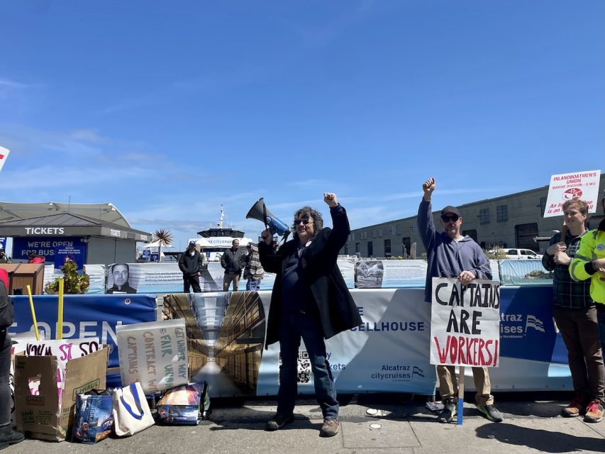 A man is speaking with a microphone