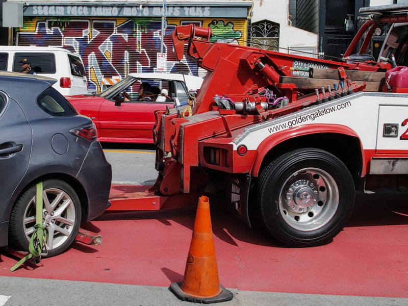 a couple of vehicles including at two truck