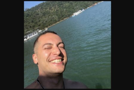 A selfie of a smiling man