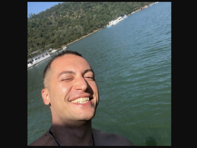 A selfie of a smiling man