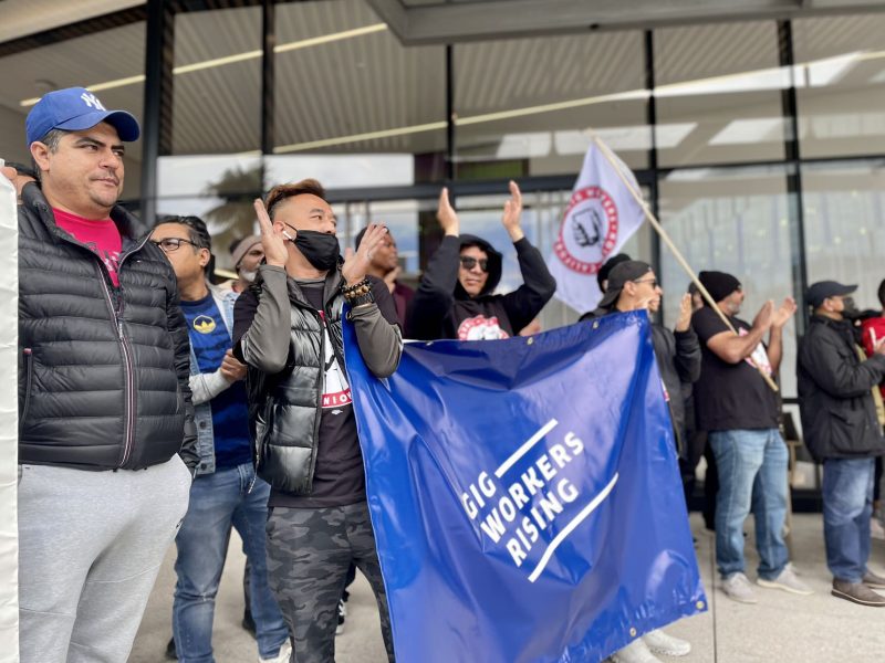 A group of people carrying signs