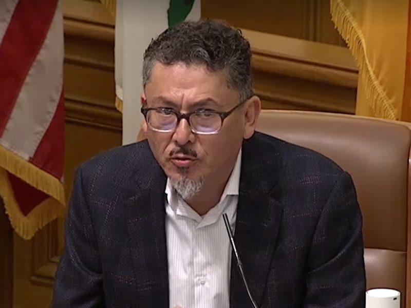 Close-up of Jesus Yanez of the Police Commission.