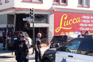 police SUV crashed into Lucca, firefighters and police officers standing nearby