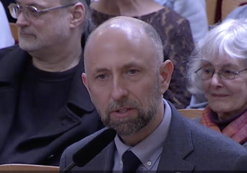 Councilmember Joel Engardio at a podium.