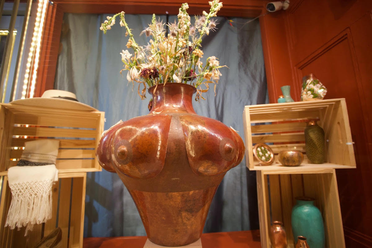 flower vase in the shape of a man's torso