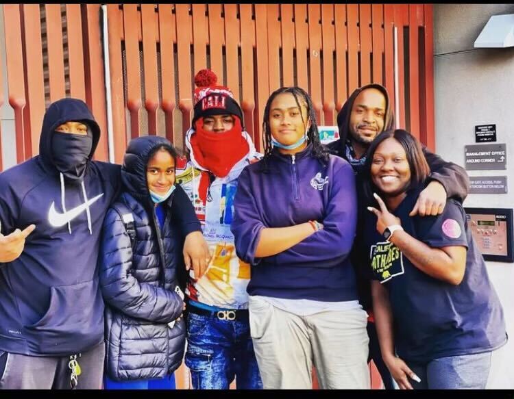 Group of six people including Ryant Bluford on the far left