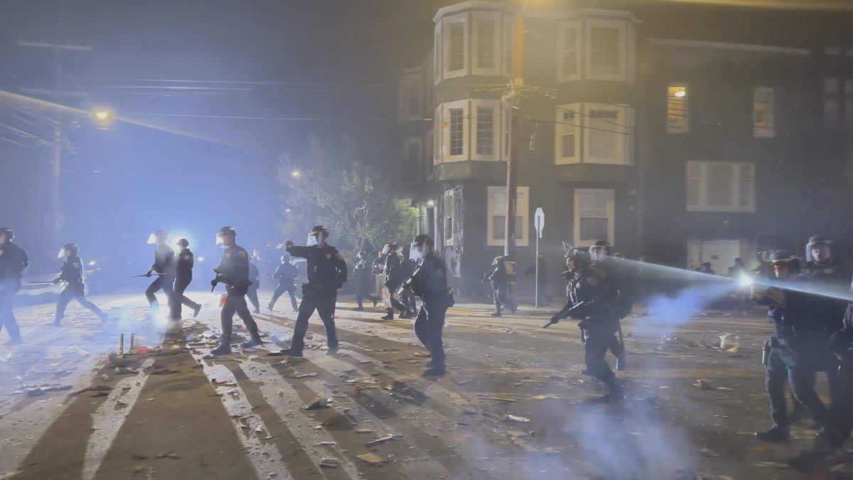 police officers running and shining flashlights