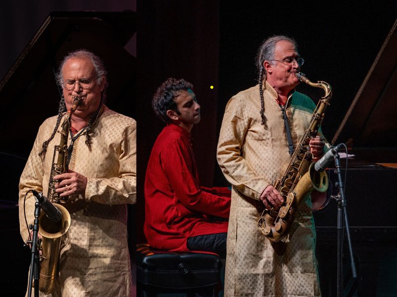 A double image of a man, George Brooks, playing a sax and a piano player in red in the background