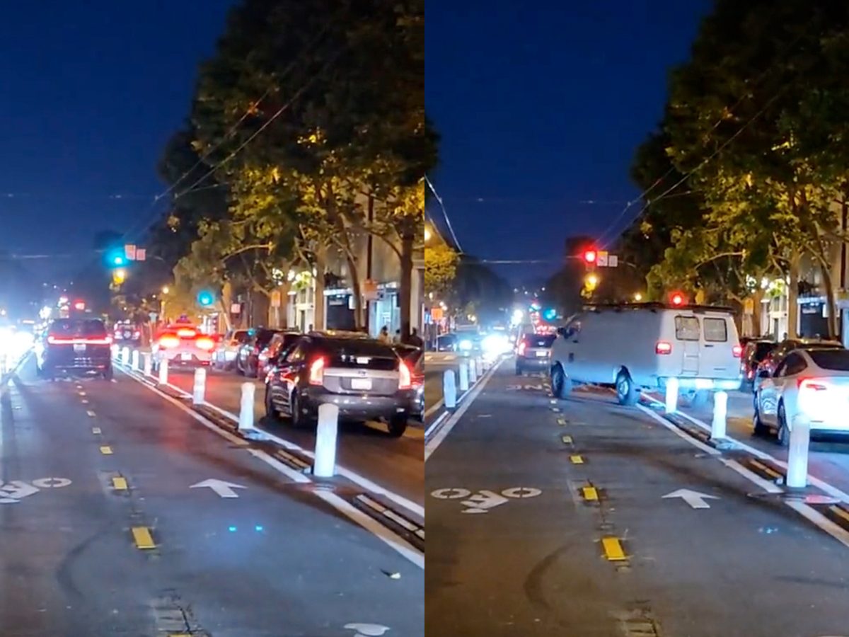 Waymo stalled on Valencia Street while several vehicles drive around it