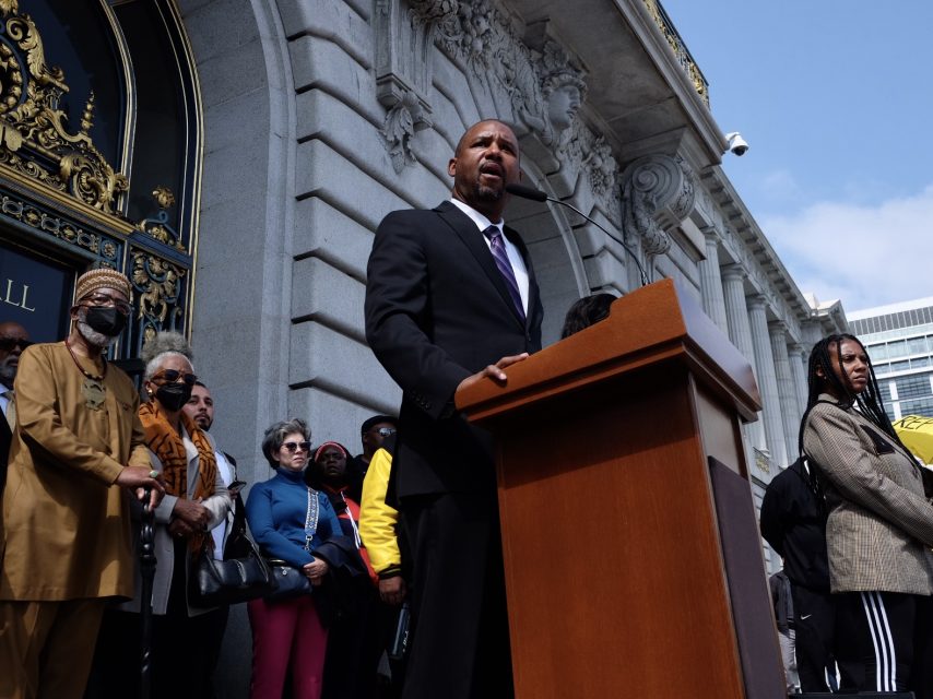 Supervisor Shamann Walton addresses the public at the reparations rally on Tuesday.