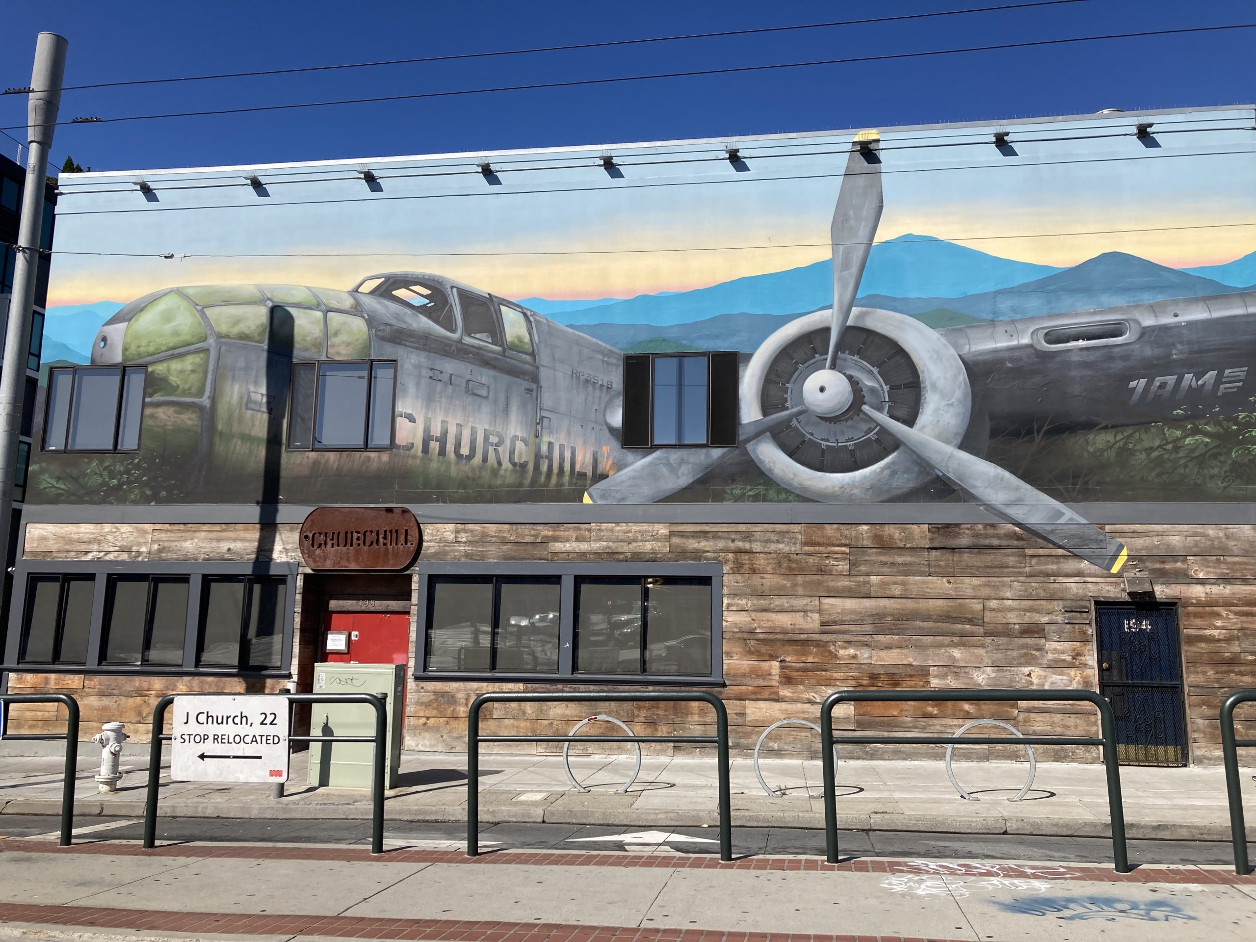 A mural of a plane that says Churchill on the side