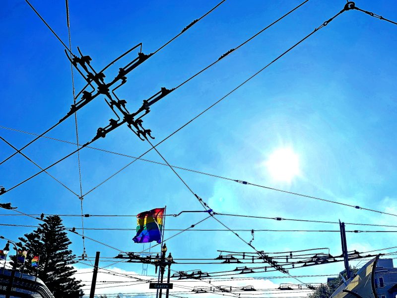A pride flag in the sky.