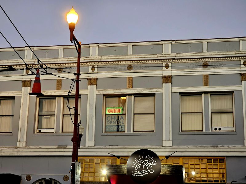 A building with a street light on it.