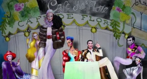 A group of people dressed up in costumes in front of a cafe.