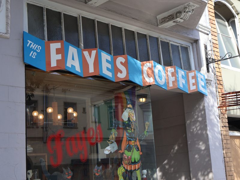 A building with a sign that says Fayes coffee.
